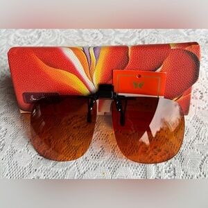 Clip on rimless sunglasses & Georgia O'Keeffe Red Canna sunglass/eyeglass case